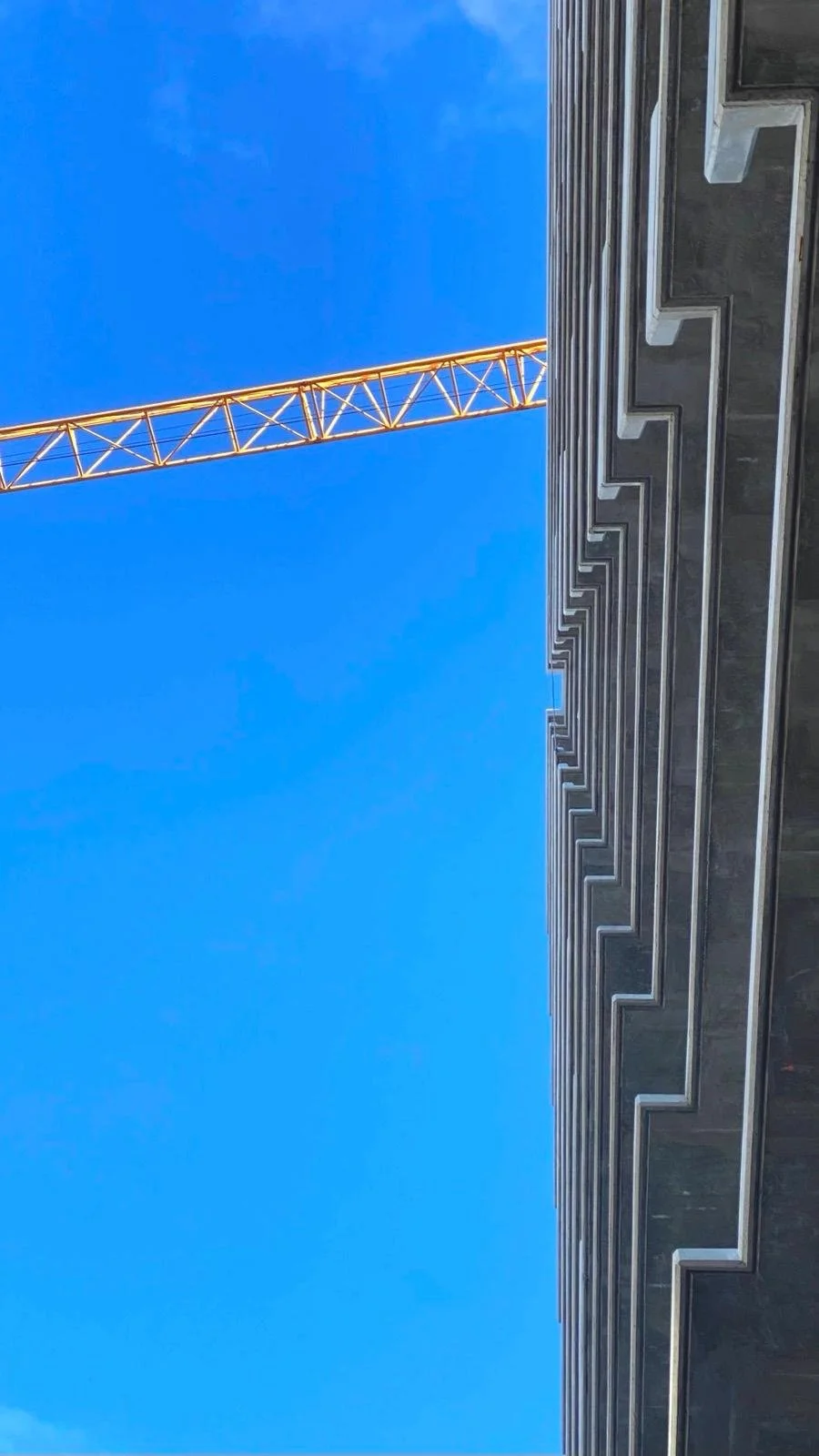 MJF crew formwork in progress on a Metro Vancouver concrete tower against blue sky